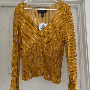 new shirt with tags, very flattering peplum